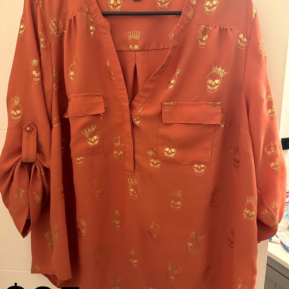 Torrid size one like new button down blouse with skulls